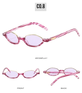 Detail view of red and white striped cat-eye frames with translucent lilac lenses