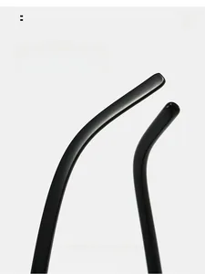 Detail of curved matte black temples on cat-eye sunglasses for ergonomic comfort