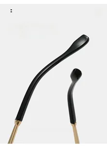 Detail view of golden metal temples and black curved tips for comfortable wearing