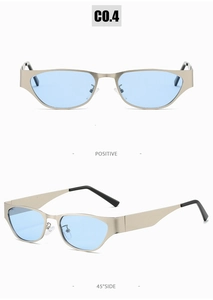 Macro detail of cat-eye metal sunglasses with light blue lenses and gold frames