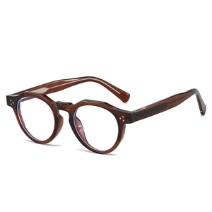 Retro round tortoise shell eyeglasses frame with blue light blocking lenses on white