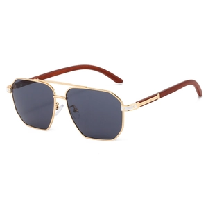 Lunettes aviateur polygonales avec monture dorée à double pont et branches bois