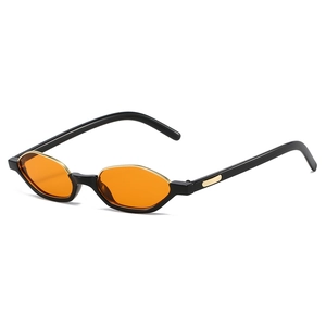 Retro cat-eye sunglasses with orange lenses, black frames and gold metal accents