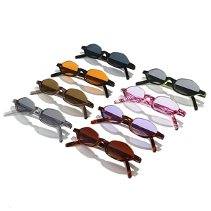 Retro slim cat eye sunglasses set in various colors including tortoiseshell and orange