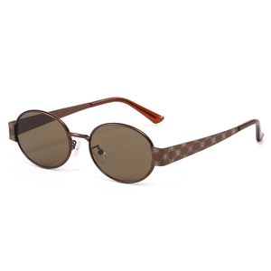 Vintage oval sunglasses with bronze metal frames and floral engraved temples