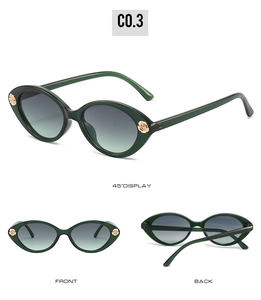 Green oval frame sunglasses for kids featuring gold rose floral accents on the sides