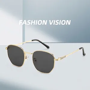 Modern polygonal sunglasses with gold metal frame and dark grey lenses for fashion wear