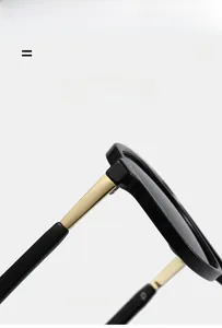 Detail shot of lightweight black sunglasses frame with super elastic golden metal temples