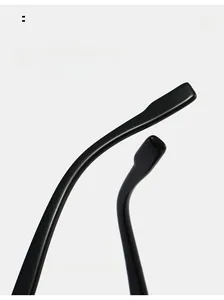 Detail of ergonomic curved glossy black sunglasses temples for a comfortable and secure fit