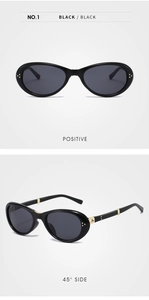 Detailansicht der ovalen schwarzen Sonnenbrille mit goldenen Punkten und Metallscharnieren