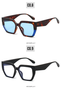 Détail des lunettes de soleil carrées surdimensionnées rétro en écaille et monture noire