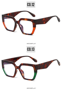 Détail des lunettes de soleil carrées écaillées avec blocs de couleur orange et vert