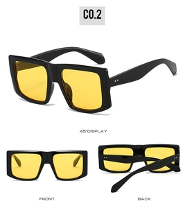 Three-view display of vintage oversized square sunglasses with black frame and yellow lenses