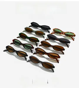 Multiple stylish retro oval sunglasses in various colors displayed on a clean white backdrop