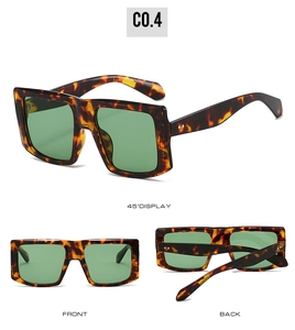 Detail views of oversized tortoiseshell square sunglasses with dark green lenses and rivets