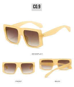 Y2K square sunglasses with amber translucent frames and brown gradient lenses
