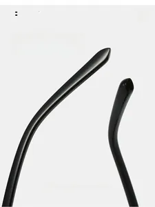 Macro detail of ergonomic black curved temple legs on fashion oval sunglasses