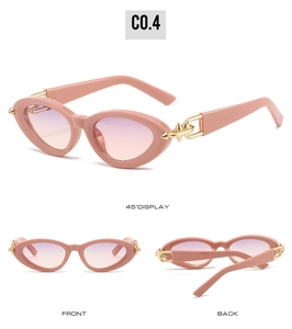 Lunettes de soleil œil-de-chat roses avec charnières flèches dorées sous divers angles