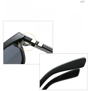 Detail of high-quality reinforced metal hinges on stylish black sunglasses frames