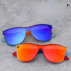 Detail of trendy colorful sunglasses with gradient frames and mirror coated lenses