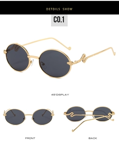 Detail view of oval sunglasses with gold snake-shaped temple relief and metallic frames