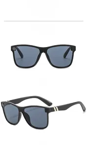 Front and side detail view of black frame sunglasses with grey lenses and metal accents
