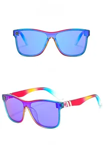 Detail view of colorful gradient frame sunglasses with icy blue mirrored lenses