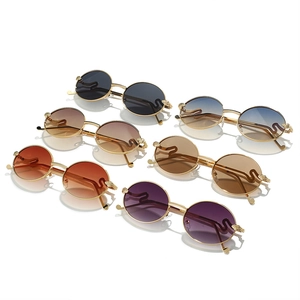 Retro oval metal sunglasses collection with unique snake wave temples in multiple colors