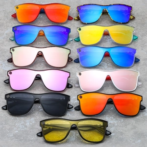 Multiple colorful UV protection sunglasses with large frames in diverse lens and frame colors