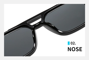 Detailed close-up of the smooth integrated nose pads on black vintage sunglasses