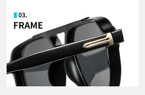 Detailed close-up of glossy black square sunglasses with iconic gold metal T-bar hinges