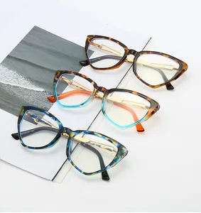 Detailed view of oversized cat-eye glasses frames in tortoise and marble patterns