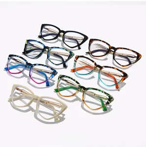 Detailed close-up showing various cat-eye frames with anti-blue light lenses and patterns