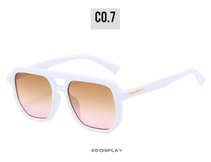 Detail of white double-bridge aviator sunglasses with gradient pink lenses and gold metal trim