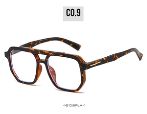Detail view of tortoiseshell double-bridge aviator frames with blue light blocking lenses