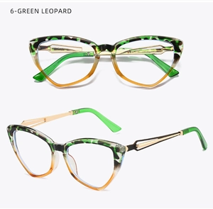 Detail of green leopard cat-eye frames with gold metal temples and gradient finish