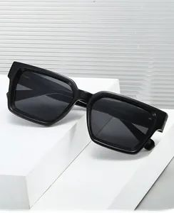 Detail view of black square polarized sunglasses showing model YX82346 on the temple arm