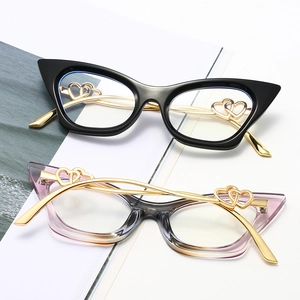 Cat eye glasses frames with gold metal temples and hollow double heart decor