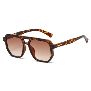 Modern double bridge aviator sunglasses with tortoise shell frames and brown gradient lenses