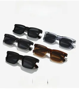 Flat lay of multiple stylish rectangular sunglasses in various classic and gradient colors