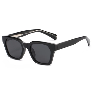 Classic thick square black sunglasses with dark lenses shown at a 45-degree side angle