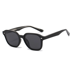 Classic black geometric sunglasses with thick frames and silver metal oval rivets