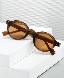 Detail of vintage round brown sunglasses showing the model size and wavy frame texture