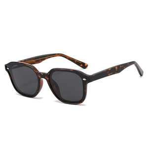 Retro tortoiseshell rectangular sunglasses with dark grey lenses and metal dot detail