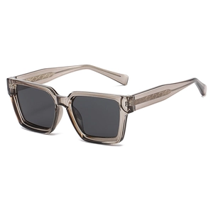 Minimalist square polarized sunglasses with translucent grey frames and geometric textured temples