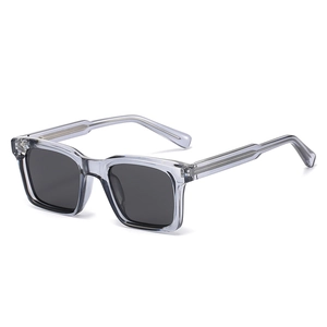 Classic transparent grey rectangular sunglasses with thick frames and dark polarized lenses