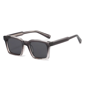 Modern rectangular polarized sunglasses with semi-transparent dark grey square frames
