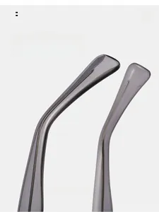Detail of dark gray curved sunglasses temples with ergonomic arc for comfortable wear