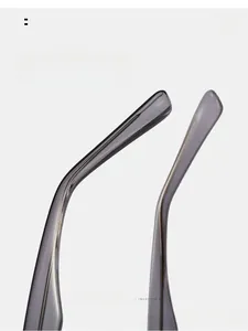 Macro detail of ergonomic curved grey translucent temples for enhanced wearing comfort