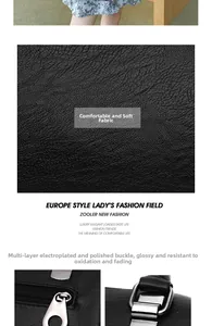 Détail de la texture cuir noir grainé et de la ferrure en métal poli de ce grand sac